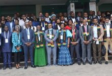 Ms Ama Pomah Boateng(tenth from right front roll) and Dr Albert Antwi-Boasiako(seventh from left front roll) with the Participants after the opening session