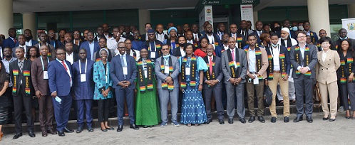 Ms Ama Pomah Boateng(tenth from right front roll) and Dr Albert Antwi-Boasiako(seventh from left front roll) with the Participants after the opening session