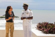 Ms AVÉ interacting with Commander Benning at the ECOWAS Multinational Maritime Coordination Center (MMCC)