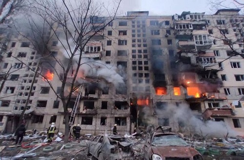 Vast extent of the damage, with fire and smoke billowing out of apartment blocks
