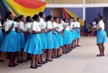 Students of Mount Carmel Girls SHS performing on stage.