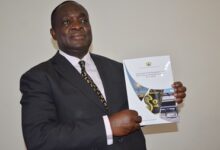 Prof. Kwame Adom Frimpong, Chairman of PIAC launching the report