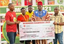 Dr Bortey (left) joins the Overlord of the Navrongo traditional area (second right) to present a dummy cheque to the winners