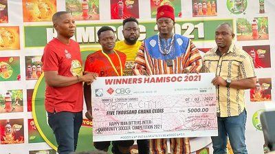 Dr Bortey (left) joins the Overlord of the Navrongo traditional area (second right) to present a dummy cheque to the winners