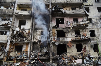 Firemen extinguish a fire inside a residential building that was hit by a missile Kyiv, Ukraine