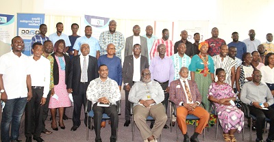 Mr James Klutse Avedzi (seated third from left),Dr Eric Oduro Osae (seated right) with the participants after the programme. Photo. Ebo Gorman