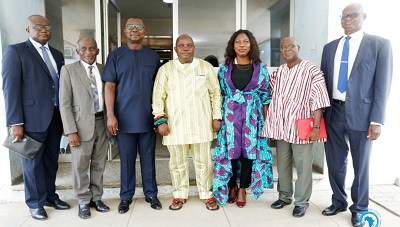 Mr Ransford Tetteh (middle) with the board members