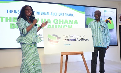 Mrs Harriet Akua Karikari( left),president of the IIAG, and a collegue with the new logo