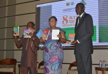 Mrs Mavis Hawa Koomson (middle) and other dignitaries launching the materials Photos Victor A. Buxton