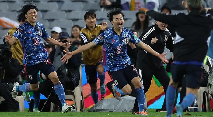 Japan players celebrating goals on the night