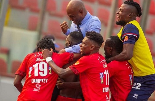 Kotoko coach, Dr Prosper Ogum joins his players to celebrate Sunday's win over the Bibiani side
