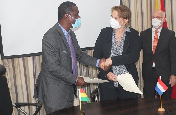Ambassador Ramses Cleland(right) and Ms Martine Hoogstraten exchanging the document. Photo Godwin Ofosu-Acheampong