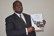 Prof. Kwame Adom Frimpong, Chairman of PIAC launching the report (2)