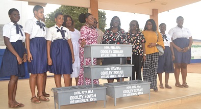 Ms Sowah (fifth from left) presenting the stoves to Mrs Obuo-Nti (5th from right) Photo Victor A. Buxton