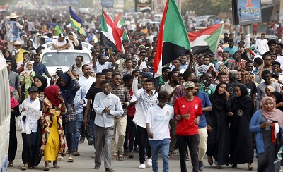 Sudanese protesting in front of Republic Palace