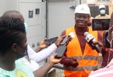 Mr Roland Osei briefing the media during the tour