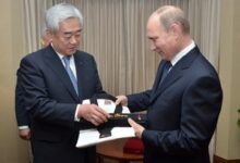 President Putin (right) was conferred an honorary black belt by World Taekwondo President Chungwon Choue in 2013