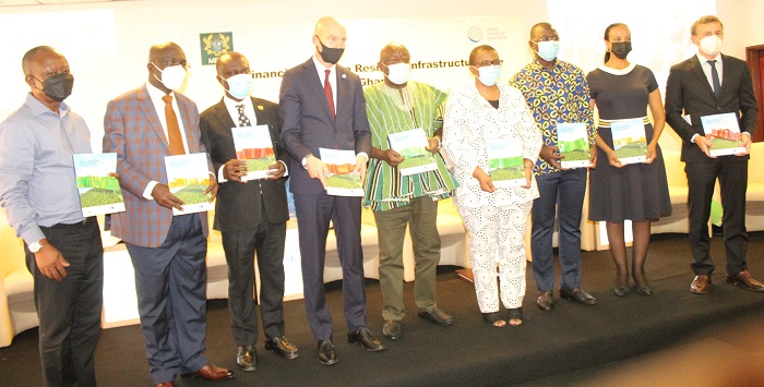 Dr Kwaku Afriyie (in smock),Prof. Gyan Baffour (third from left),Prof. Patrick Verkooijen (fourth from left) and other dignitaries launching the report. Photo: Ebo Gorman