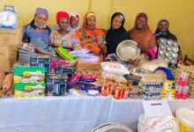 Some of the beneficiary women with their starter packs