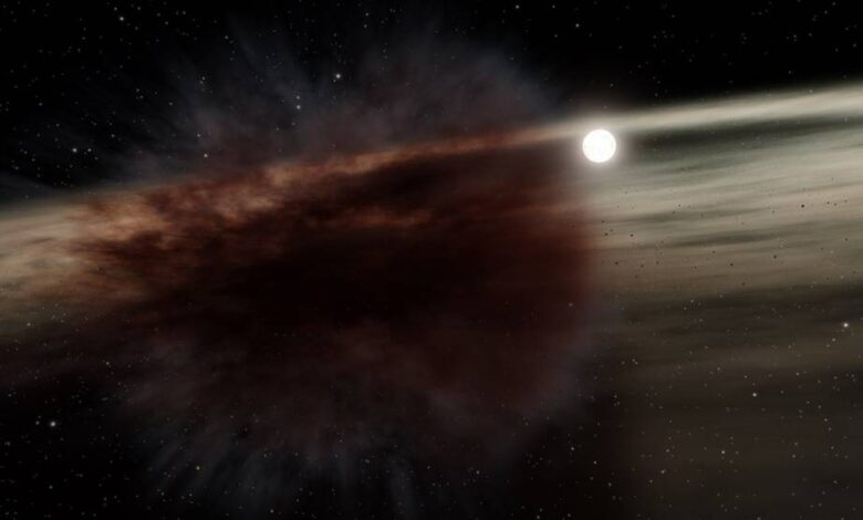 This illustration depicts the result of a collision between two large asteroid-sized bodies: a massive debris cloud around a young star. NASA’s Spitzer saw a debris cloud block the star HD 166191, giving scientists details about the smashup that occurred. Credits: NASA/JPL-Caltech