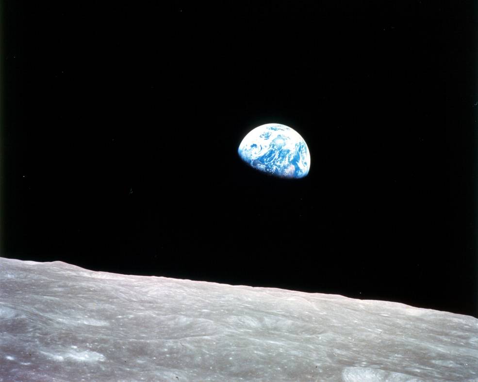 The iconic “Earthrise” image of Earth appearing over the Moon’s horizon as seen from the Apollo 8 spacecraft, taken during a live broadcast with NASA astronauts from the lunar orbit on Christmas Eve, Dec. 24, 1968. Credits: NASA