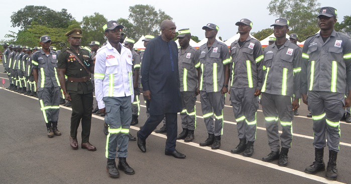 Mr Ambrose Dery (second from right) inspecting the parade of the city response team Photo Victor A. Buxton