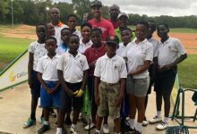 Daniel List (in black cap) with some young golfers