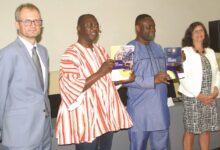 Dr John Kumah(second from right),Dr Mohammed A. Adam (second from left) launching the reports.With them include Mrs Regina Bauerochse Barbosa (right) and Ambassador Philipp Stalder