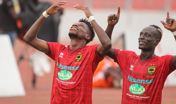 Etouga (left) and Dickson Afoakwa celebrate Kotoko's win