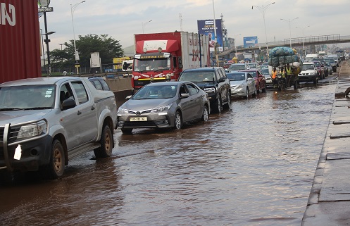 Vehicles wading through floods at the Dome area Photo Anita Nyarko-Yirenkyi