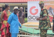 Hon. Kwame Osei Prempeh, handing over the beds to Brigadier General Azumah Bugri, whilst other officers look on