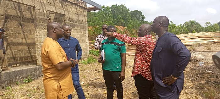 Dr Dasmanibriefing the Vice Chairman of the Committee, Mr Elvis Morris Donkor and other members. Pics 2,3, 4, 6 show the FGR temporary site being prepared for the Appiatse victims.