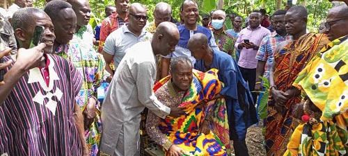 Nana Obinyebida installing Mr Aidoo at the Kumikrom farm. Looking on (right in spectacles) is Chief of the area Nana Akowuah