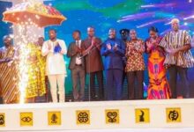 Vice President Dr Bawumia(fifth from right) and other dignitaries applauding after launching the National Youth Volunteers Programme NYVP