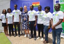 Ms Jutta Urpilainen (middle)EU commissioner for International Partnerships with the entreprenuers after going round the exhibition. Photo. Vincent Dzatse