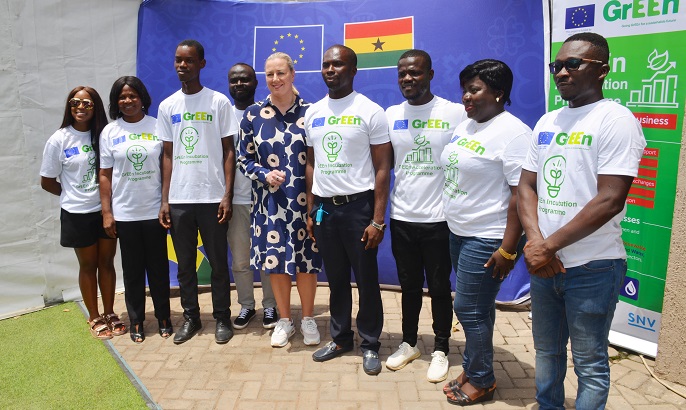 Ms Jutta Urpilainen (middle)EU commissioner for International Partnerships with the entreprenuers after going round the exhibition. Photo. Vincent Dzatse