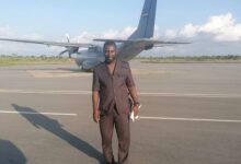 Mr Divine Bosson at the Airport for his flight