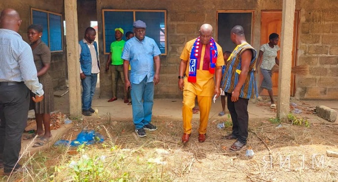 Mr Owusu-Bio and other officials inspecting work on the project