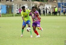 Bechem's Abdul Karim (in green) in a tussle for the ball with Abdul-Aziz Nurudeen