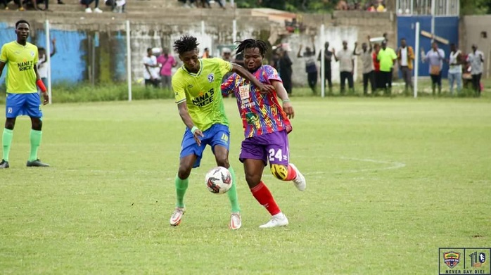 Bechem's Abdul Karim (in green) in a tussle for the ball with Abdul-Aziz Nurudeen