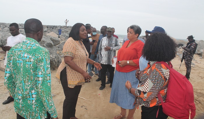 (inset)Rev Mrs Gifty Lamptey(secnd from left)CEO Sedalco, briefing the committee members on the Dansoman Sea defence wall. Photo Godwin Ofosu-Acheampong