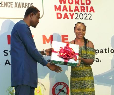 Miss Gyimaah Folley ( Right ) receiving her award.