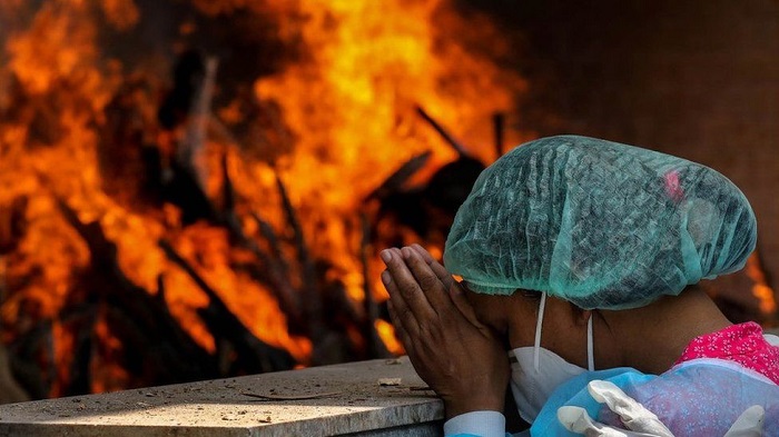 Cremation sites in India struggled with the number of dead