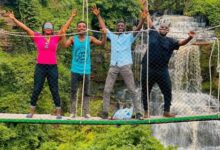 Revelers at Kintampo waterfalls