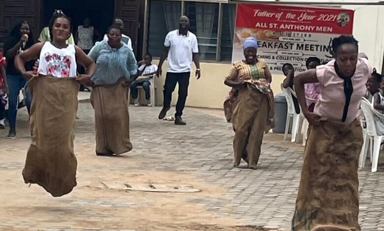 A hot sack race among parishioners during the Feast Day