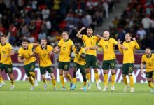 Australia players celebrate the qualification to Qatar 2022