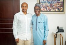 • Ayew poses with the Speaker of Parliament after the invitation