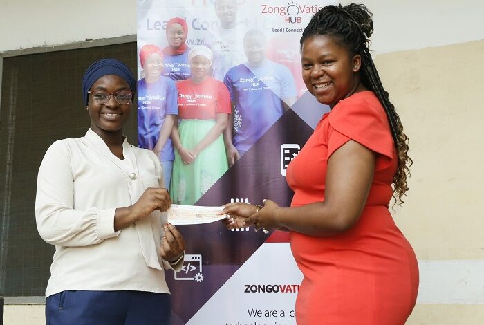 • Mrs Quarshie (right) presenting the cheque to an official of Zongovation