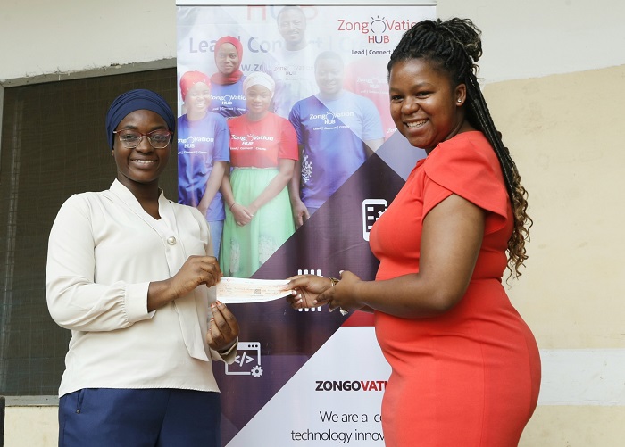 • Mrs Quarshie (right) presenting the cheque to an official of Zongovation