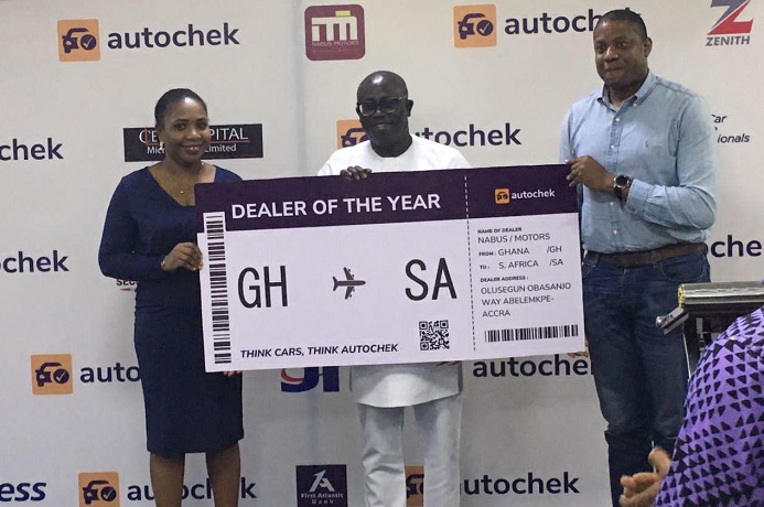 Officials of Nabus Motors receiving the award